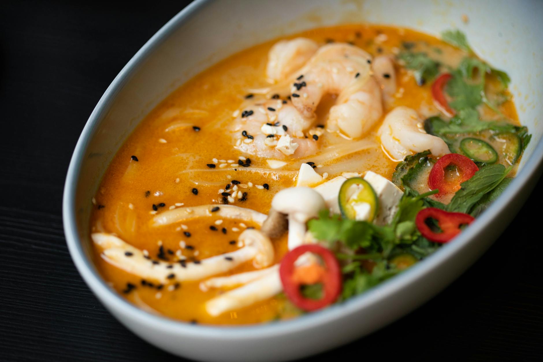 Miso soup bowl with tofu, nori, and green onions