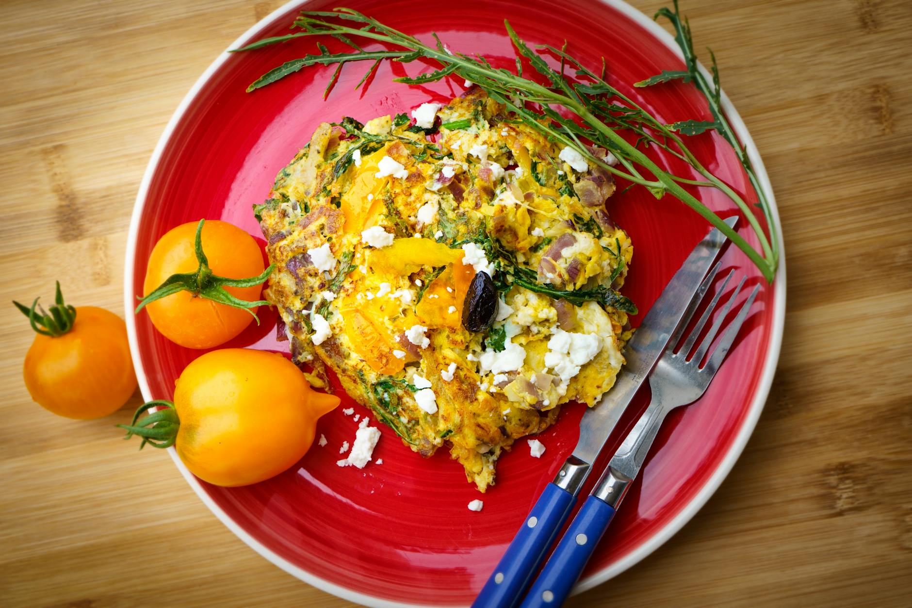 Fluffy egg bites with melted cheese on a plate
